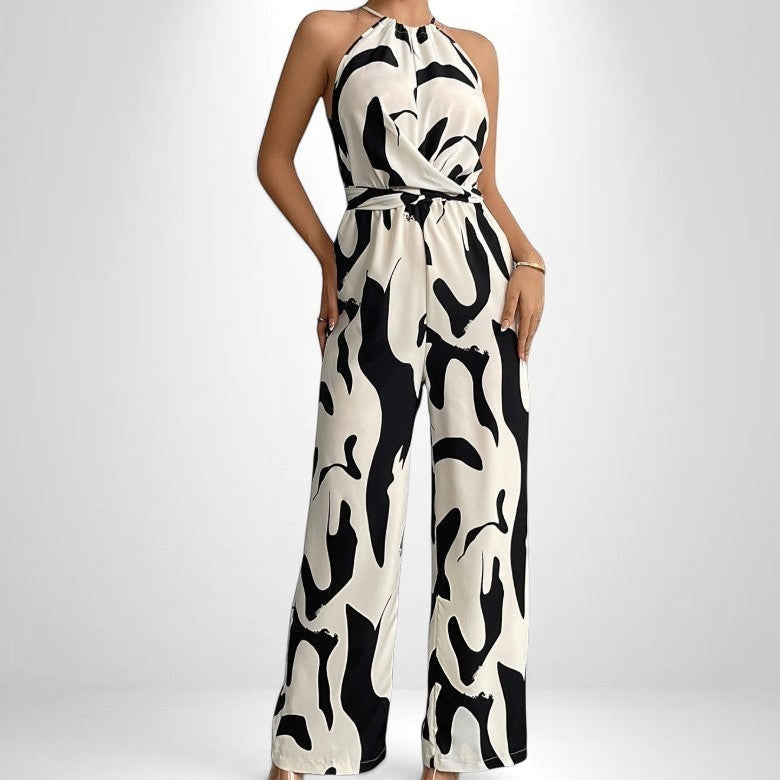 ZOFIA ATELIER white and black abstract print halter neck sleeveless wide-leg jumpsuit with elastic waist.
