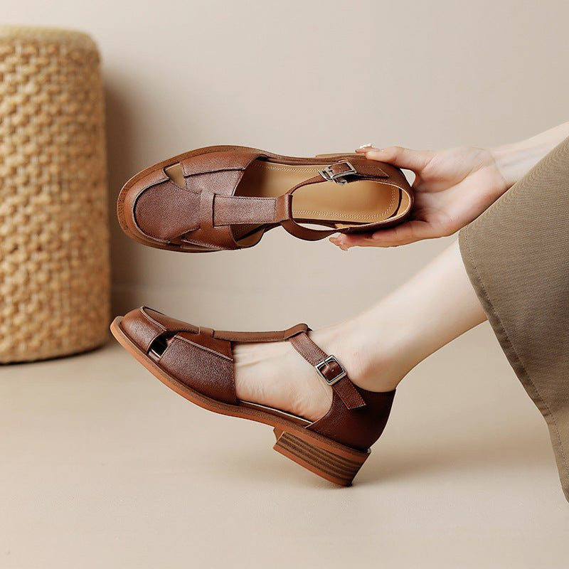 ZOFIA ATELIER Adrianne retro flat sandals in brown cowhide with woven detail and buckle strap.
