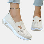 ZOFIA ATELIER AGATA beige knit slip-on sneakers with cushioned sole and decorative cut-outs.