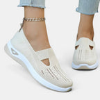 ZOFIA ATELIER AGATA beige knit slip-on sneakers with cushioned sole and decorative cut-outs.