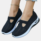 ZOFIA ATELIER AGATA black knit slip-on sneakers with cushioned sole and cutout detail.