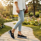 ZOFIA ATELIER AGATA black knit slip-on sneakers with cushioned sole and cutout detail.