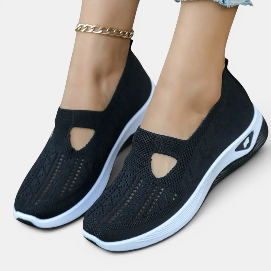 ZOFIA ATELIER AGATA black knit slip-on sneakers with cushioned sole and cutout detail.