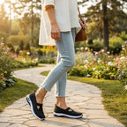 ZOFIA ATELIER AGATA black knit slip-on sneakers with cushioned sole and cutout detail.