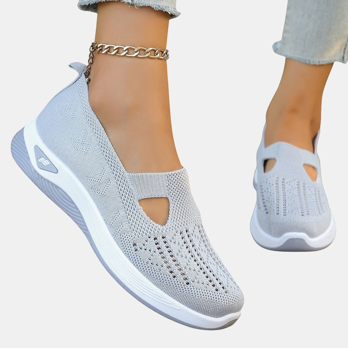 ZOFIA ATELIER AGATA light grey knit slip-on sneakers with a cushioned sole and decorative cut-out detail.