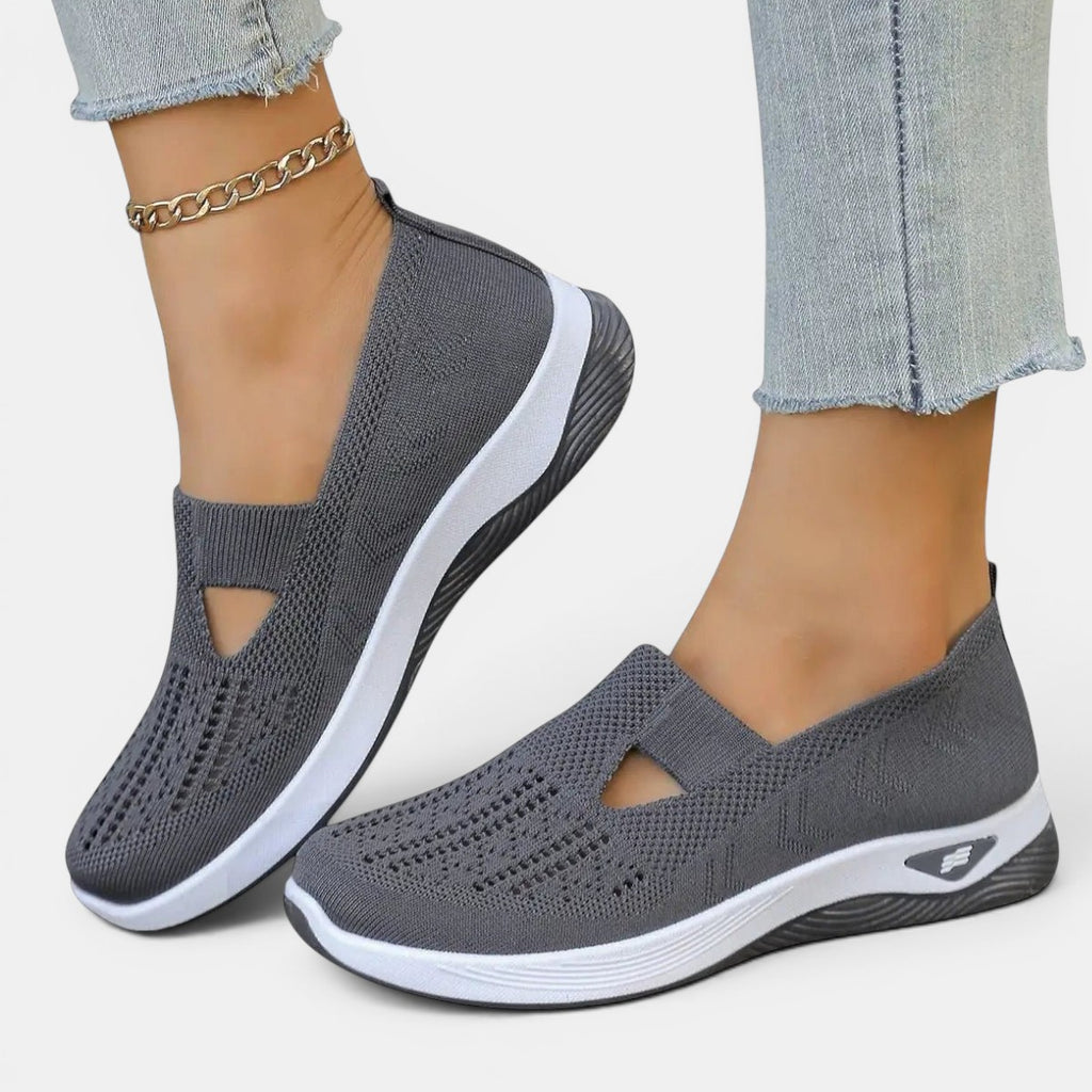 ZOFIA ATELIER AGATA grey knit slip-on sneakers with cushioned sole and cutout detail.