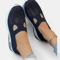 ZOFIA ATELIER AGATA navy blue knit slip-on sneakers with cut-out details and white soles.