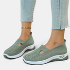 ZOFIA ATELIER AGATA olive green knit slip-on sneakers with cushioned sole and cutout detail.