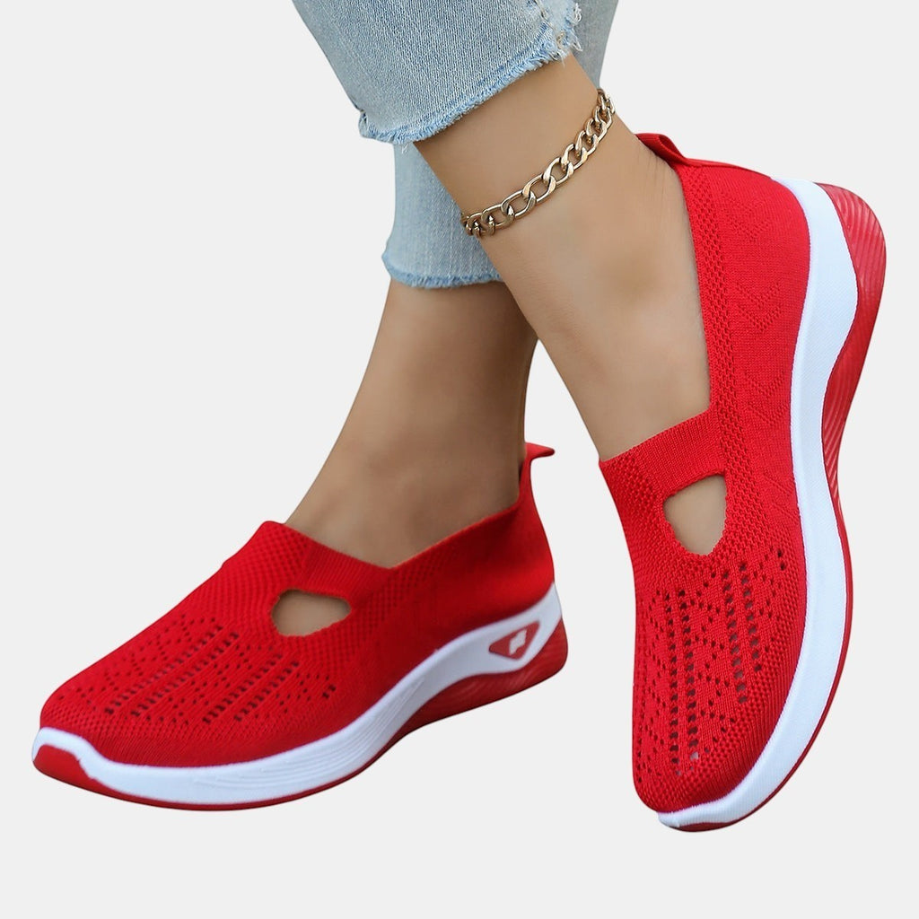 ZOFIA ATELIER AGATA red knit slip-on sneakers with white soles and decorative cut-out detail.