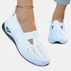 ZOFIA ATELIER AGATA white knit slip-on sneakers with a cushioned sole and decorative cutout detail.