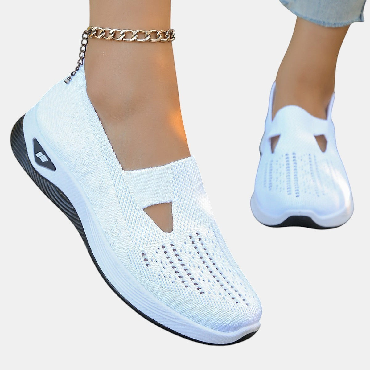 ZOFIA ATELIER AGATA white knit slip-on sneakers with a cushioned sole and decorative cutout detail.