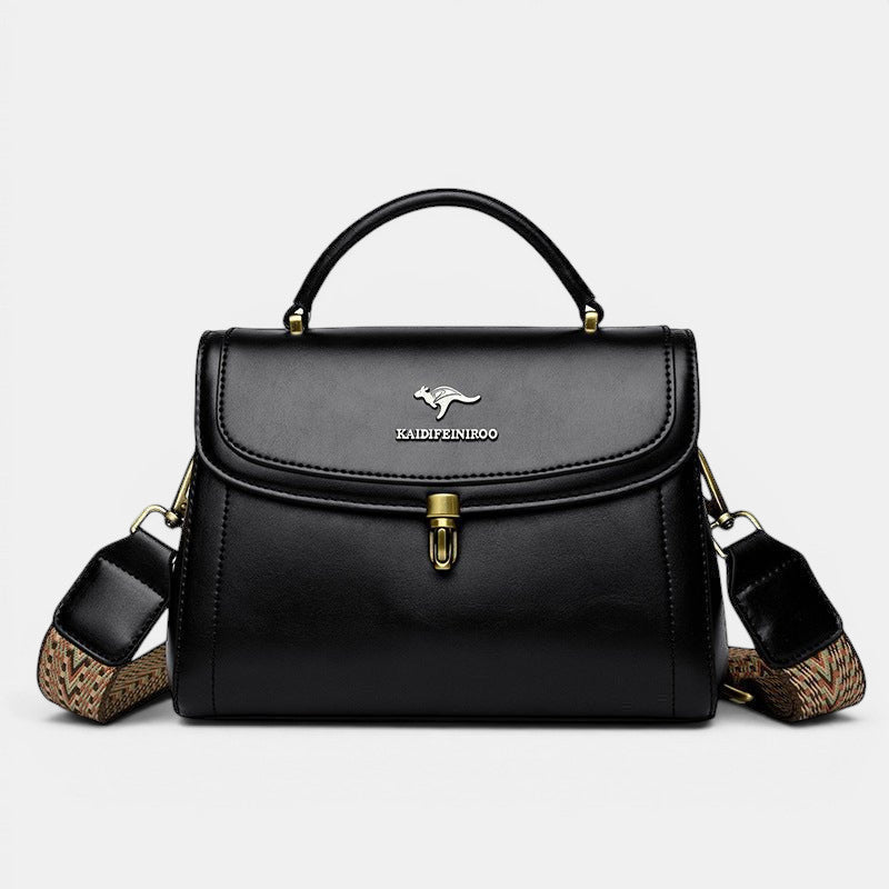 ZOFIA ATELIER Agnieszka black PU leather crossbody handbag with textured strap and gold hardware.