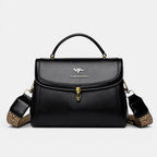 ZOFIA ATELIER Agnieszka black PU textured crossbody handbag with gold hardware and patterned strap.