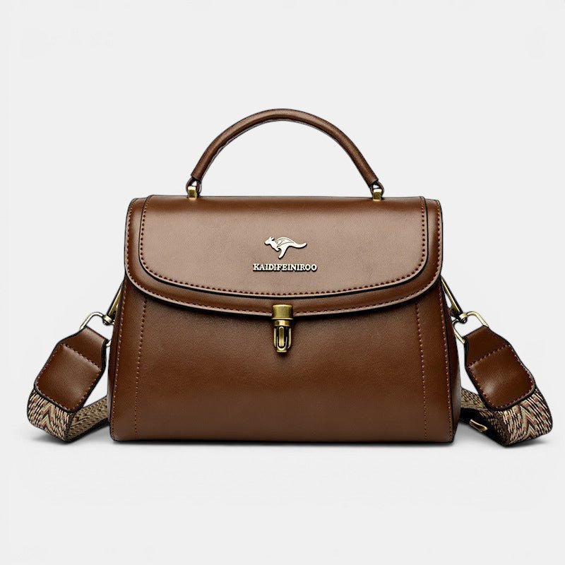 ZOFIA ATELIER Agnieszka brown PU leather crossbody handbag with textured strap and gold hardware.