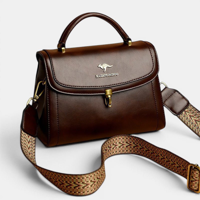 ZOFIA ATELIER Agnieszka textured crossbody handbag in dark brown PU leather with gold hardware and patterned strap.