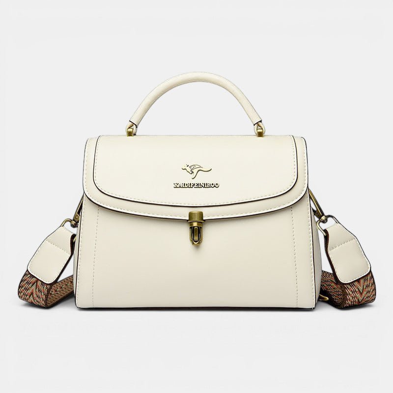 ZOFIA ATELIER Agnieszka white PU leather crossbody handbag with textured strap and gold clasp.