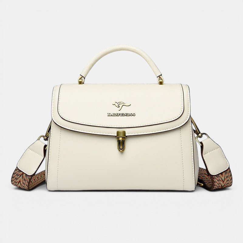 ZOFIA ATELIER Agnieszka white PU leather crossbody handbag with textured strap and gold hardware.