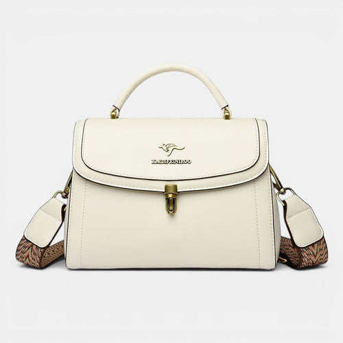 ZOFIA ATELIER Agnieszka white PU leather crossbody handbag with textured strap and gold hardware.