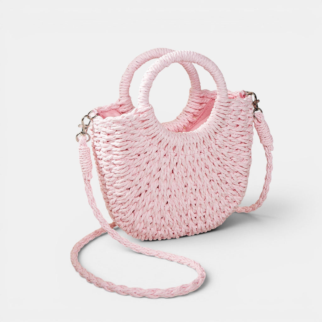 ZOFIA ATELIER ANNA beach crossbody bag in woven paper with pink peach skin lining. Features top handles and a detachable strap.