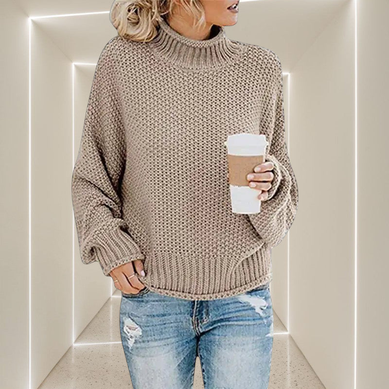 ZOFIA ATELIER ANNA beige chunky knit turtleneck sweater with relaxed fit and ribbed cuffs.