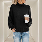 ZOFIA ATELIER ANNA black chunky knit turtleneck sweater with relaxed fit and long sleeves.