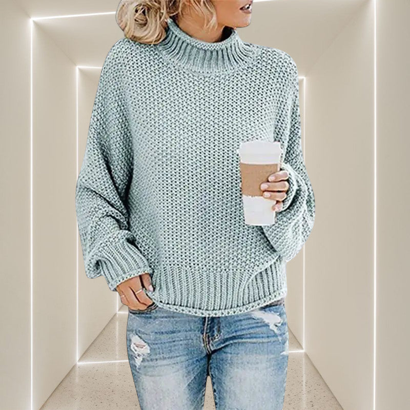 ZOFIA ATELIER ANNA light blue chunky knit turtleneck sweater with relaxed fit and ribbed cuffs.