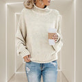 ZOFIA ATELIER ANNA cream chunky knit turtleneck sweater with relaxed fit and ribbed cuffs.