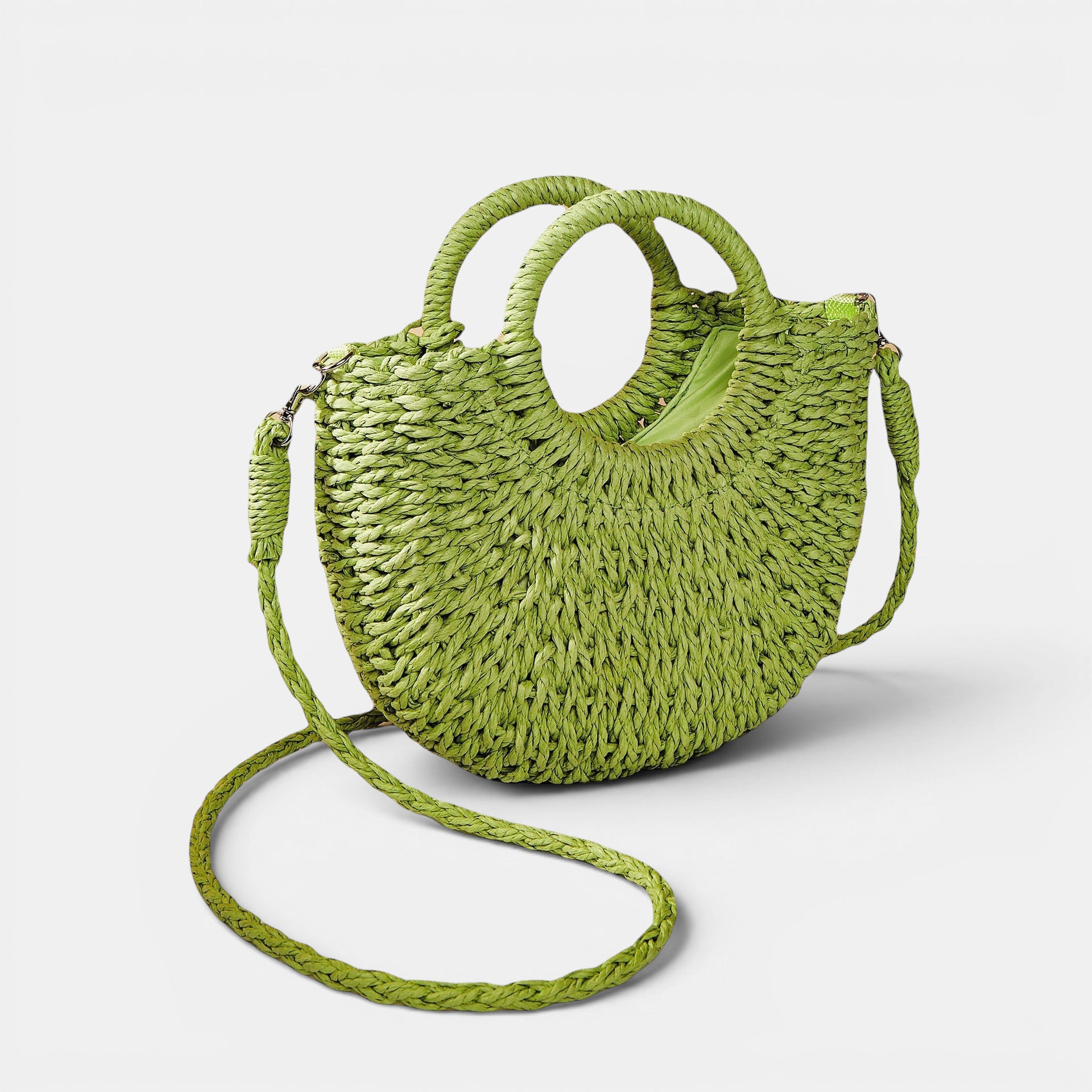 ZOFIA ATELIER ANNA green woven paper crossbody bag with double handles and peach skin lining.