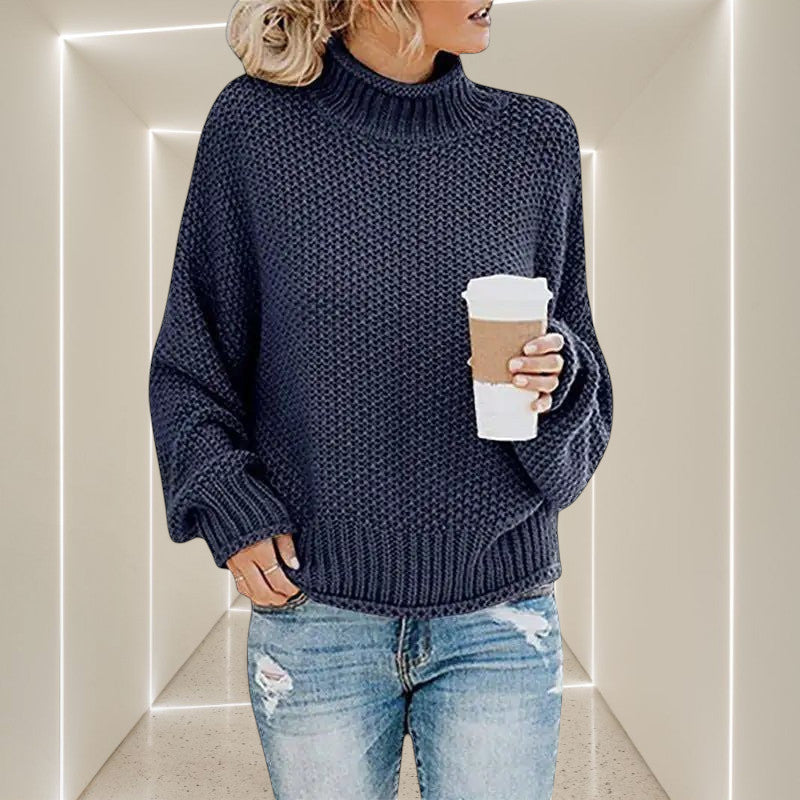 ZOFIA ATELIER ANNA navy blue chunky knit turtleneck sweater with relaxed fit and ribbed cuffs.