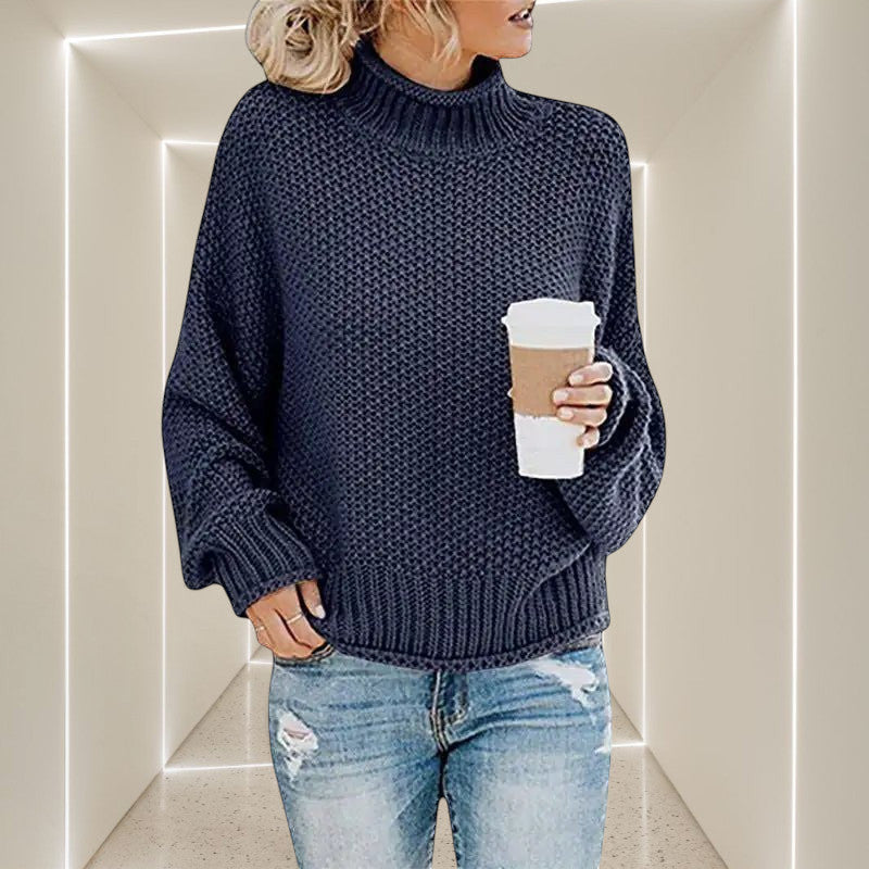 ZOFIA ATELIER ANNA navy blue chunky knit turtleneck sweater with relaxed fit and ribbed cuffs.