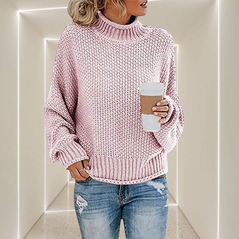 ZOFIA ATELIER ANNA pink chunky knit turtleneck sweater with relaxed fit and ribbed cuffs.