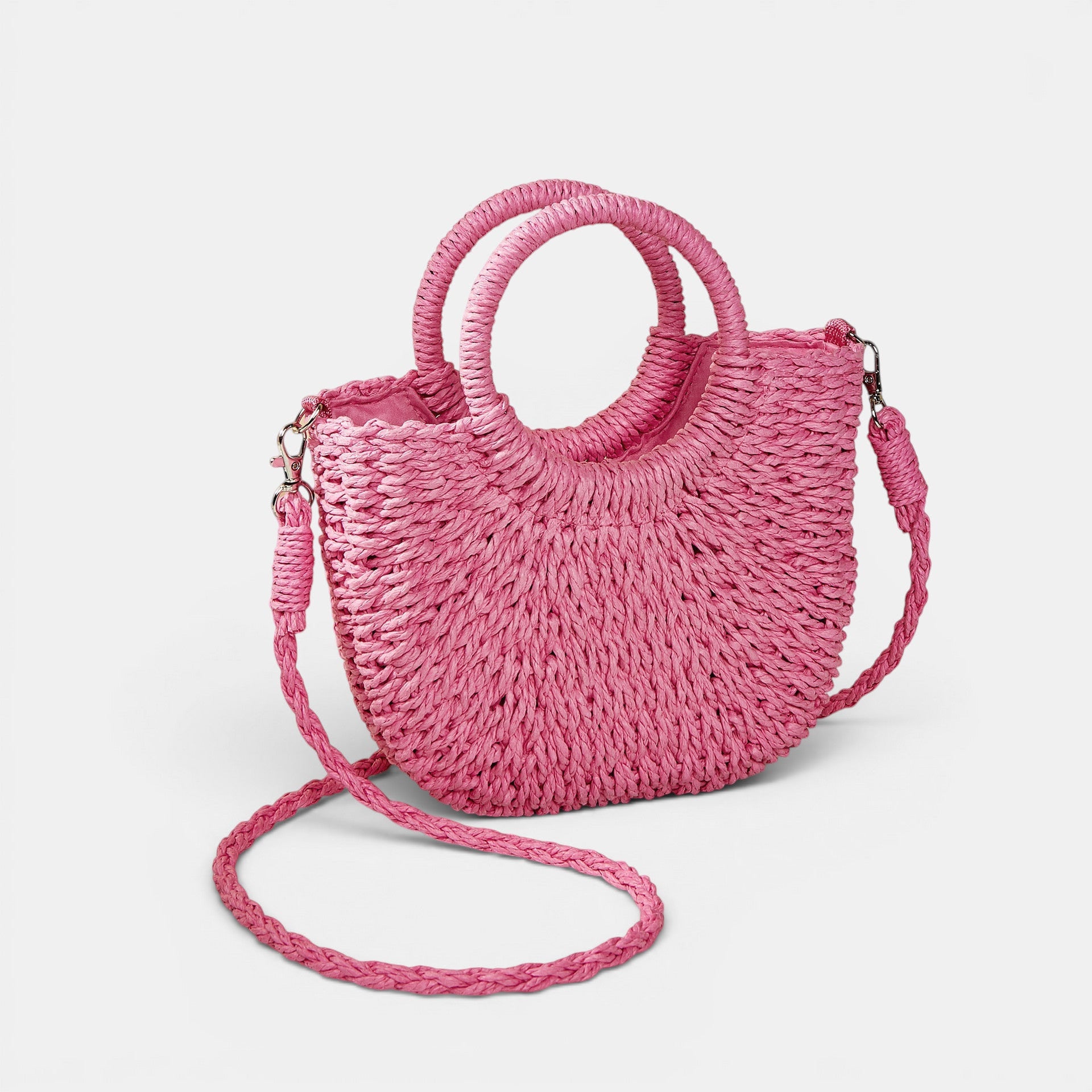 ZOFIA ATELIER ANNA pink woven paper crossbody bag with circular top handles and braided strap.