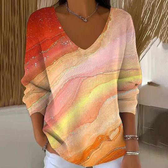 ZOFIA ATELIER artistic print V-neck long sleeve top in orange, pink, and yellow hues with a flowing fit.