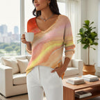 ZOFIA ATELIER artistic print V-neck long sleeve pullover sweater in orange, yellow, and pink hues with a flowing fit.