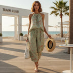 ZOFIA ATELIER light green linen blend backless camisole and wide-leg cropped pants set with red floral print.