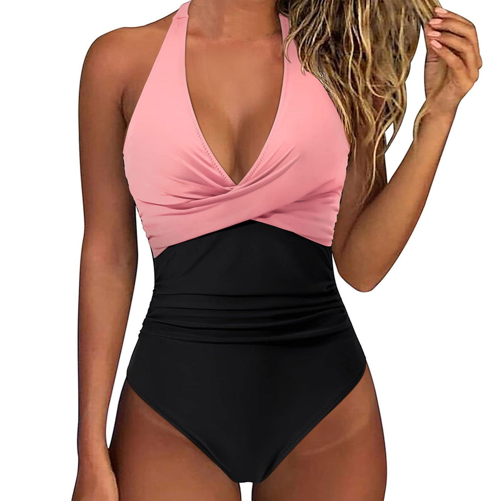 ZOFIA ATELIER pink and black colorblock halter neck one-piece swimsuit with ruched waist and backless design.