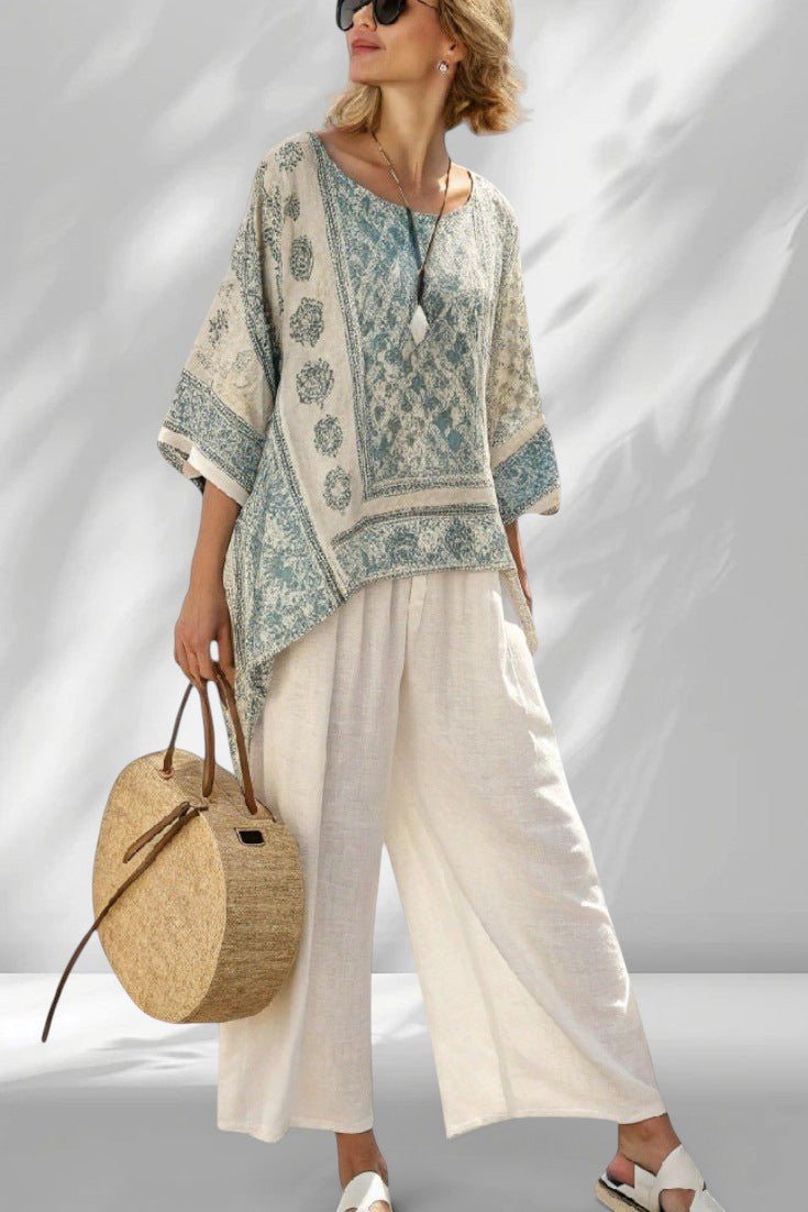 ZOFIA ATELIER BARBARA beach lounge set in cream and blue print with wide leg pants. Lightweight, flowing, resort-style.