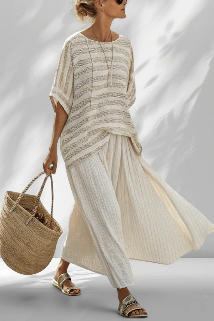 ZOFIA ATELIER BARBARA beach lounge set in cream with subtle stripes. Flowing two-piece outfit with loose top and wide-leg pants.
