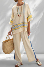 ZOFIA ATELIER BARBARA beach lounge set in cream with blue and yellow striped details. Lightweight linen-blend fabric.