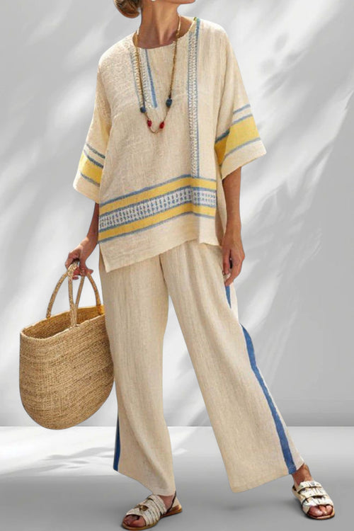 ZOFIA ATELIER BARBARA beach lounge set in cream with blue and yellow striped details. Lightweight linen-blend fabric.