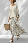 ZOFIA ATELIER BARBARA lounge set: cream linen-blend top with split sleeves and striped wide-leg pants.