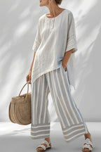 ZOFIA ATELIER BARBARA lounge set: light grey linen-blend top with button detail and striped wide-leg pants.