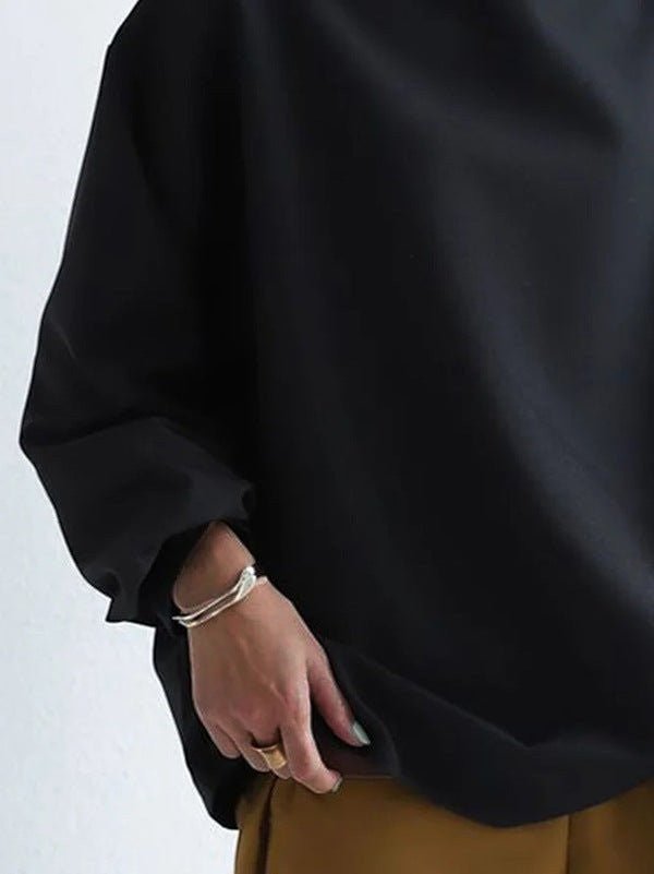ZOFIA ATELIER BASIA loose black polyester sweater with long sleeves and a relaxed fit.