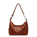 ZOFIA ATELIER BEATA leisure tote bag in brown PU leather with dumpling shape and single strap.