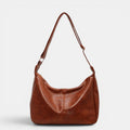 ZOFIA ATELIER BEATA leisure tote bag in brown PU leather with a dumpling shape and single strap.