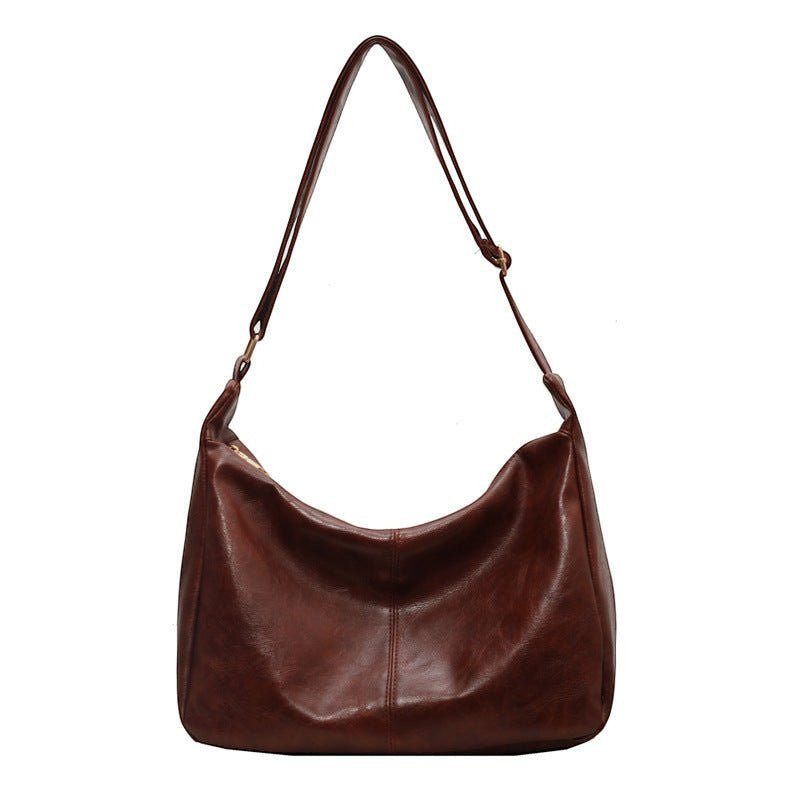ZOFIA ATELIER BEATA leisure tote bag in dark brown PU leather with a dumpling shape and single strap.