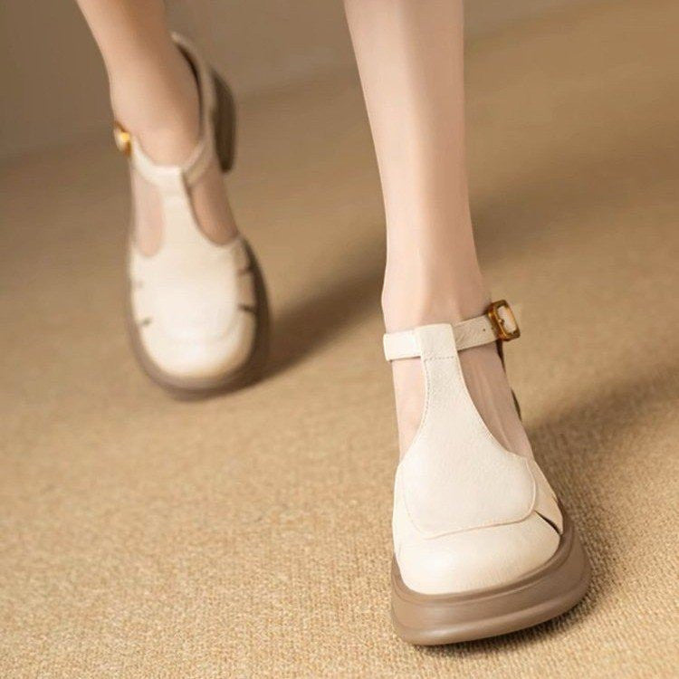 ZOFIA ATELIER beige PU round-toe chunky heels with ankle strap and buckle closure.