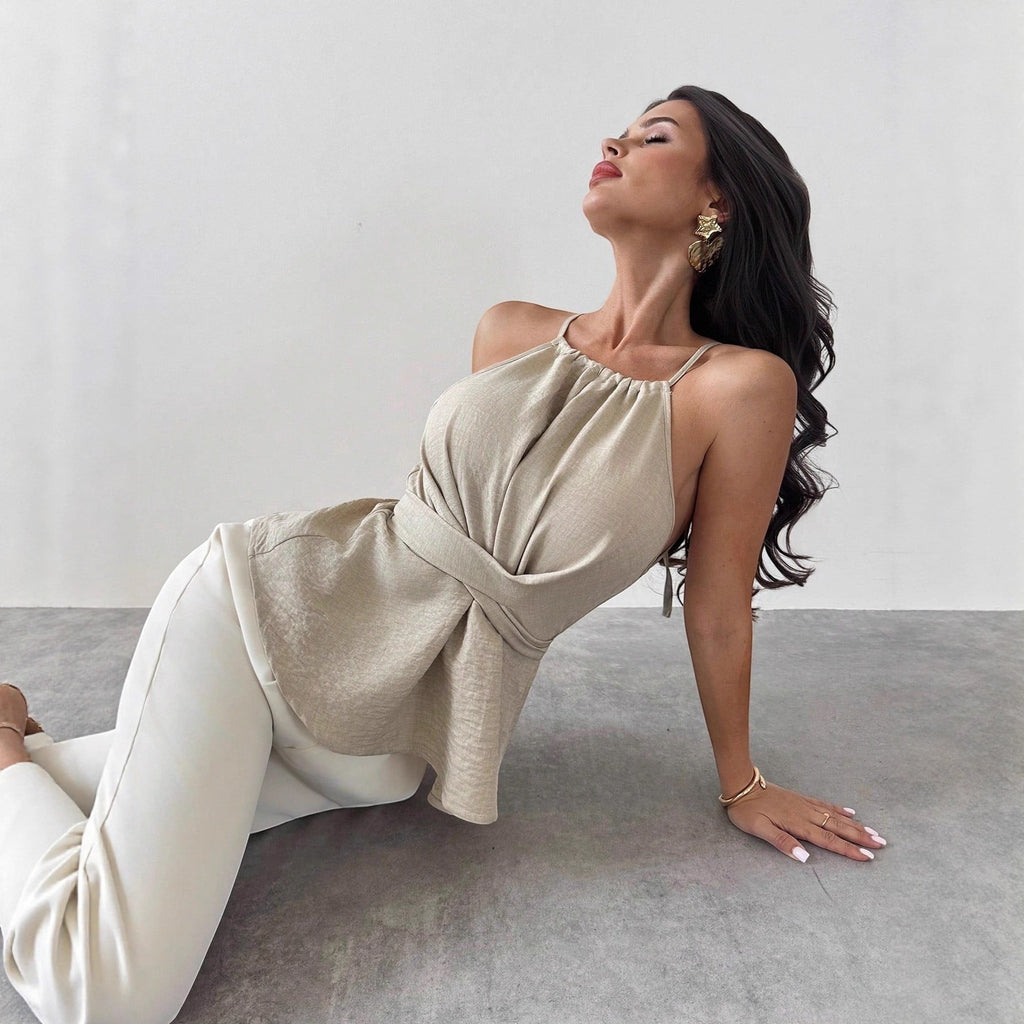 ZOFIA ATELIER beige halter neck sleeveless blouse with cinched waist and open back detail