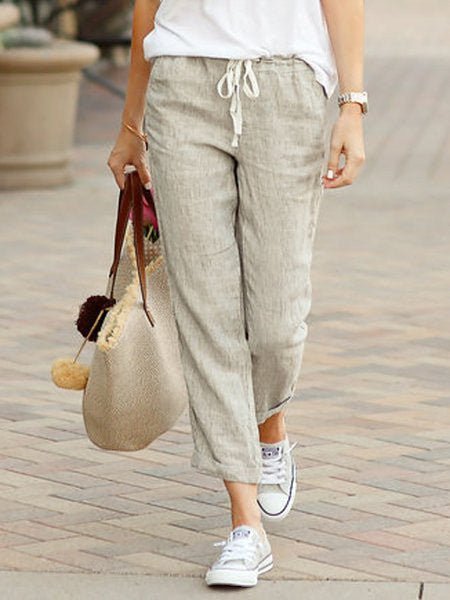 ZOFIA ATELIER beige linen-blend drawstring pants with elastic waist and cuffed hem.