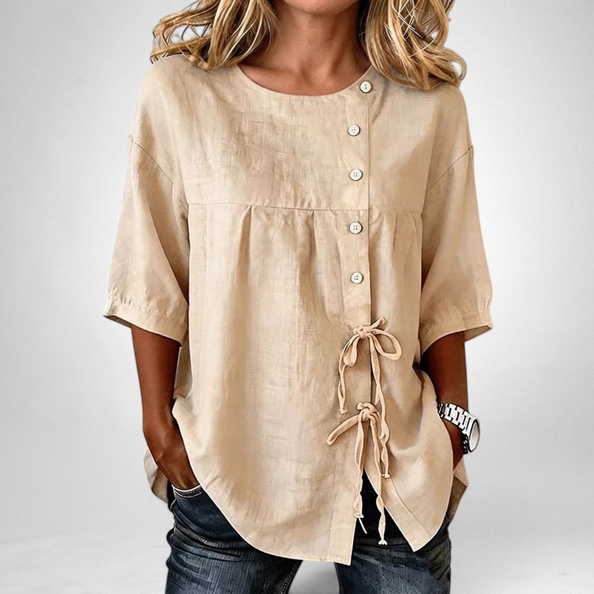 ZOFIA ATELIER beige linen asymmetric lace-up shirt with princess sleeves and button closure.